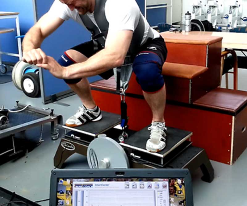 Force comparison between barbell and kBox flywheel squat using force plates and SmartCoach.
