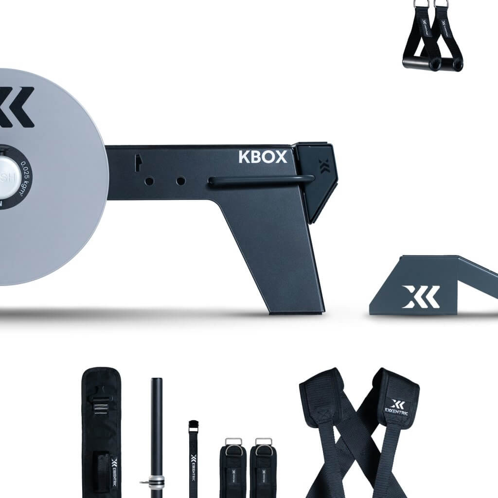 kBox platform with M flywheel, kGrips, kBar, ankle cuffs, hip belt, decline board, extension strap and harness